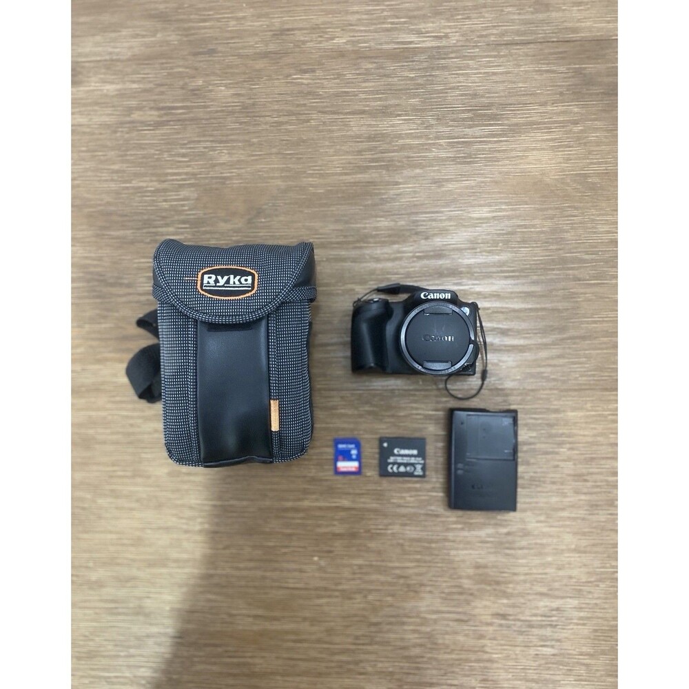 Canon PowerShot SX400 IS Digital Camera Bundle With SD Card Charger Battery Bag